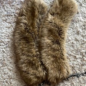 Two faux fur pieces. Very pretty. Light brownish in color.